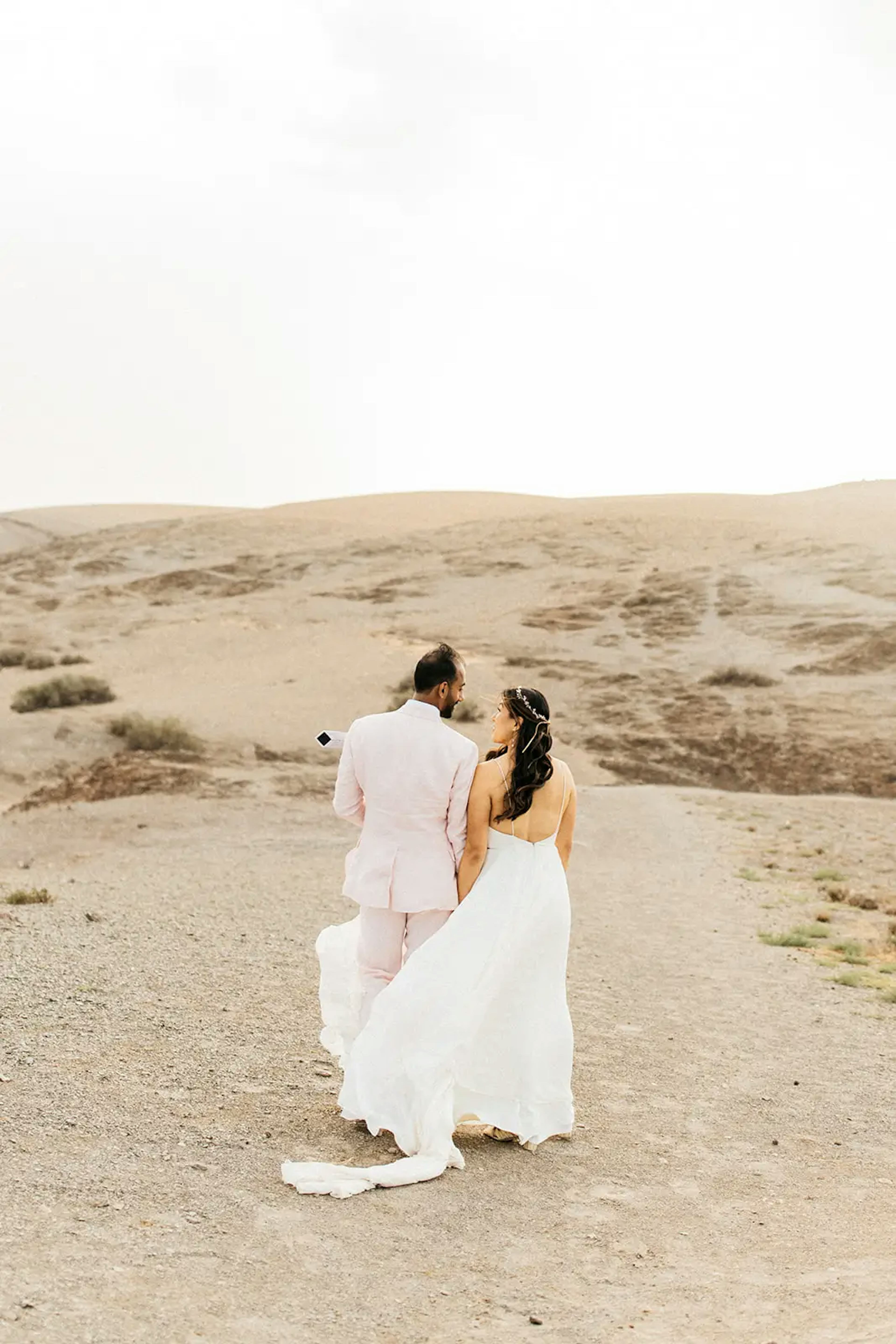 Couple walking in Agafay desert