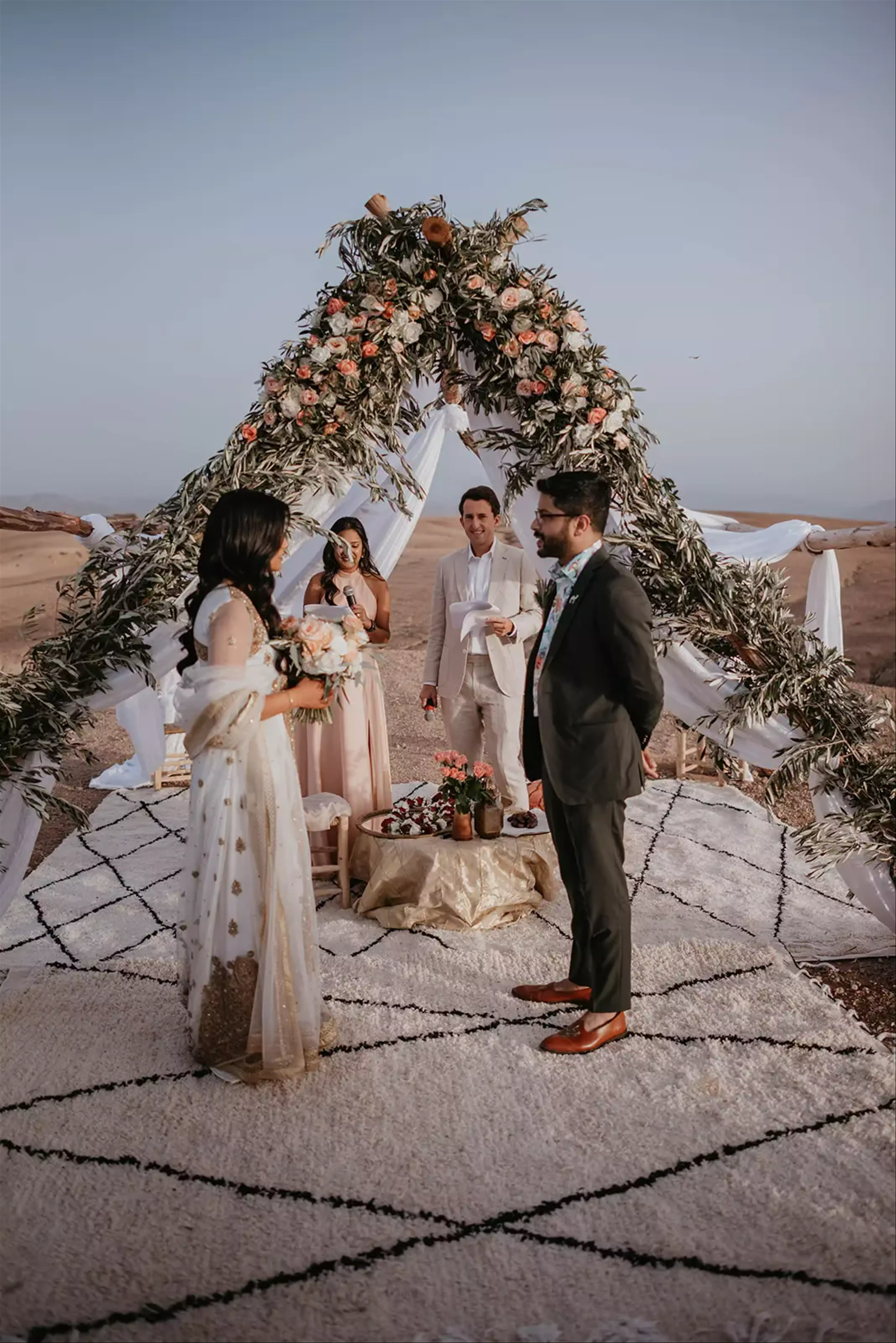 Couple standing at top of aisle