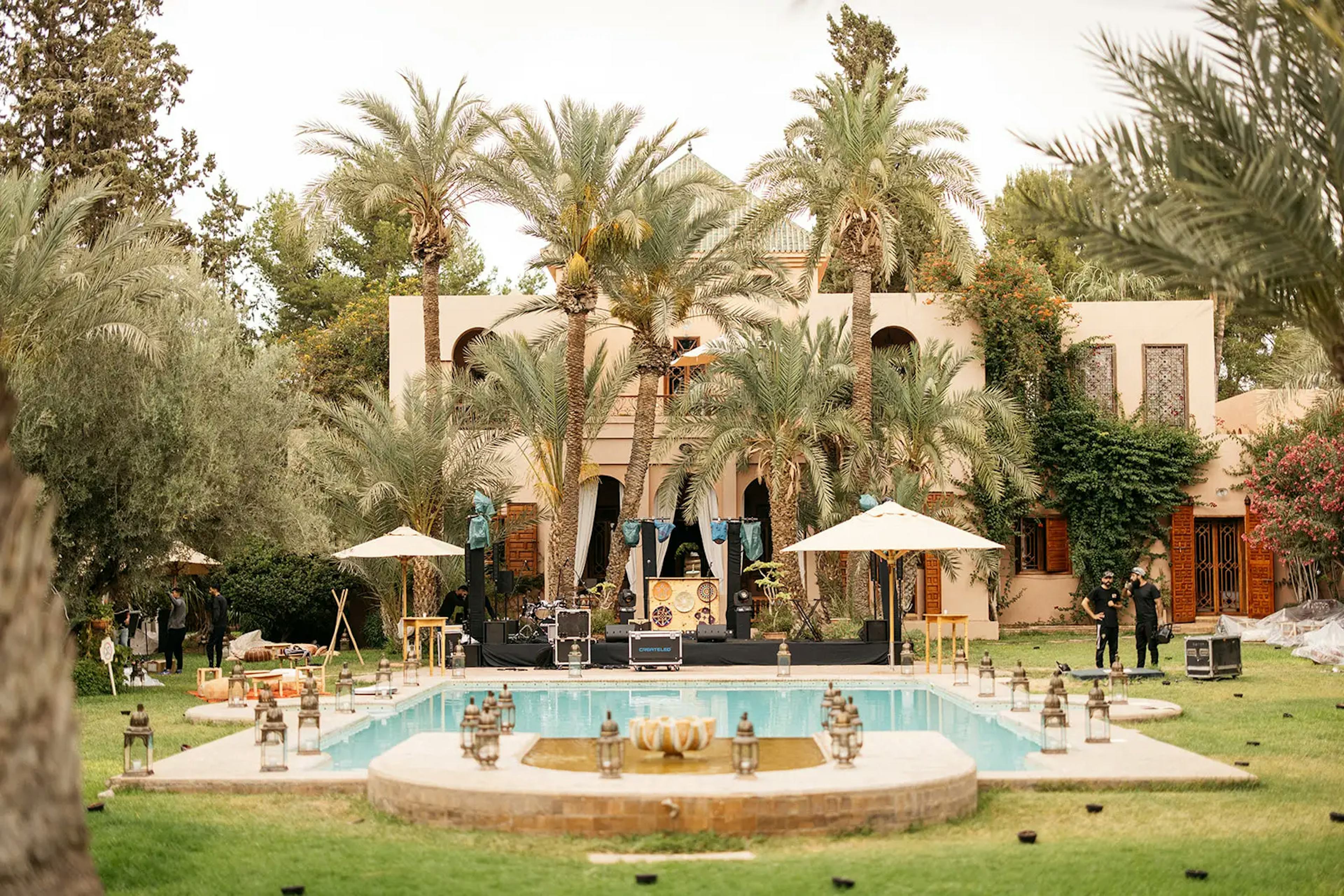 Moroccan architecture of the wedding venue with a basin