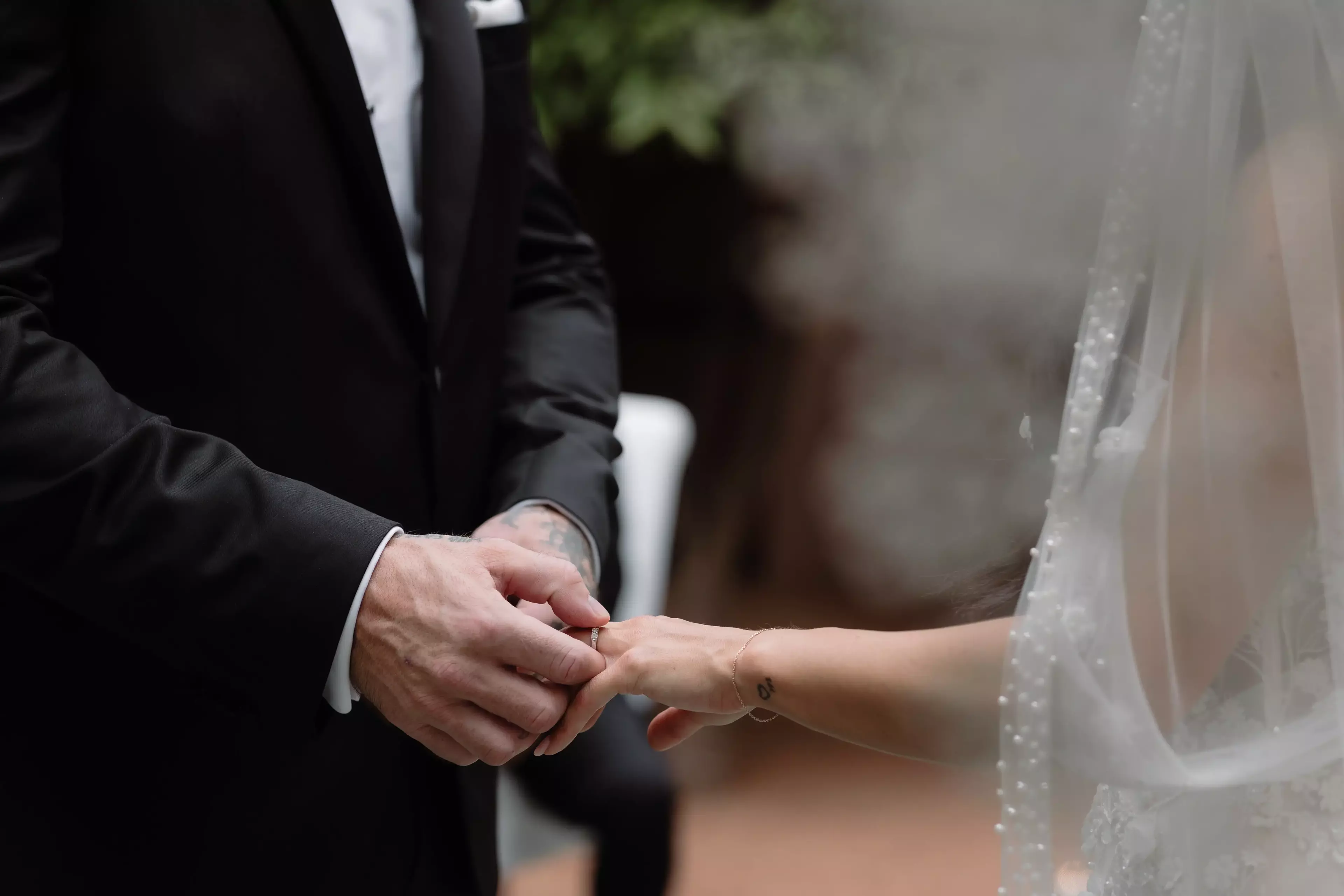 Wedding rings at intimate ceremony