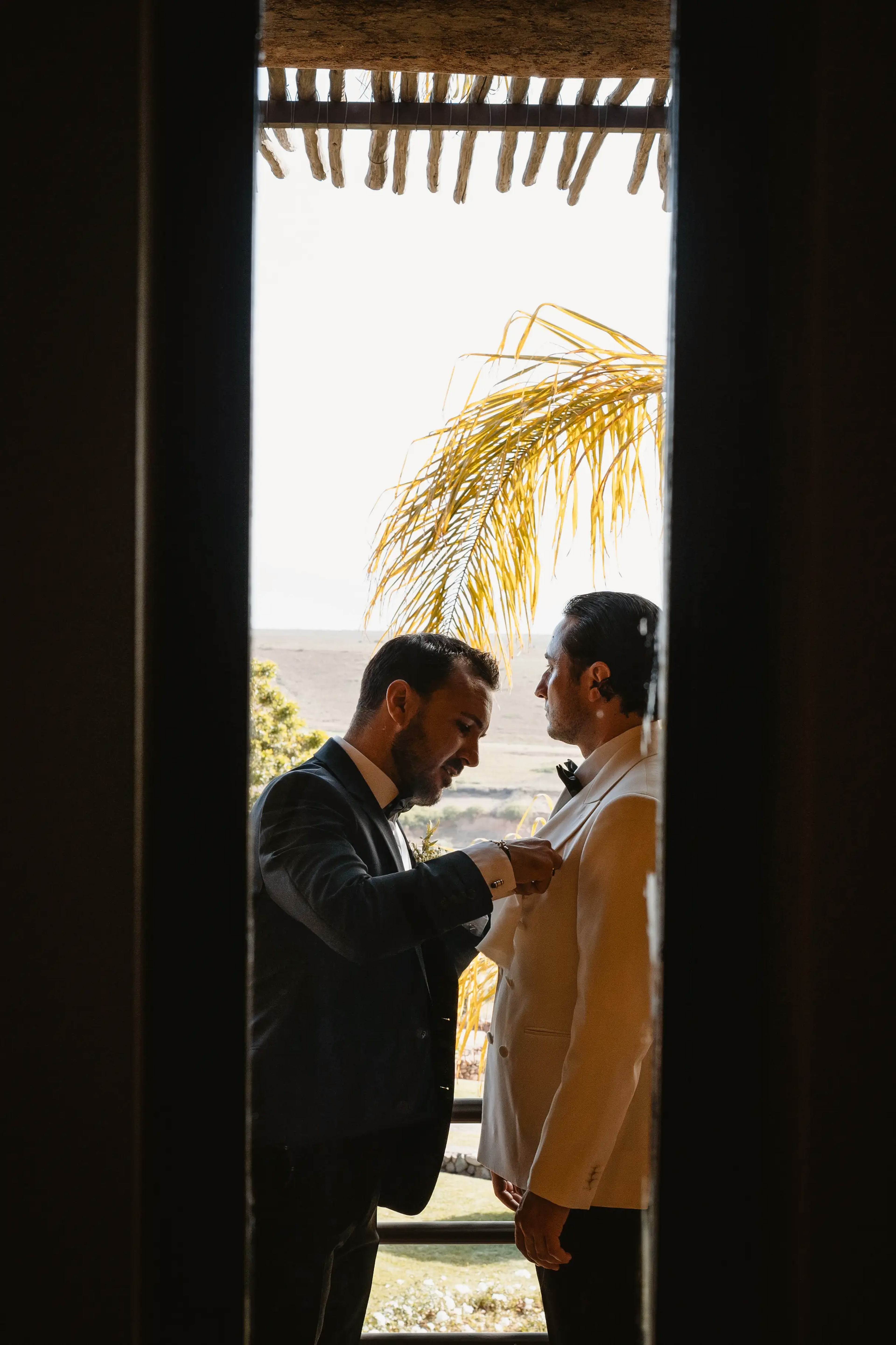 Groom getting ready for wedding ceremony