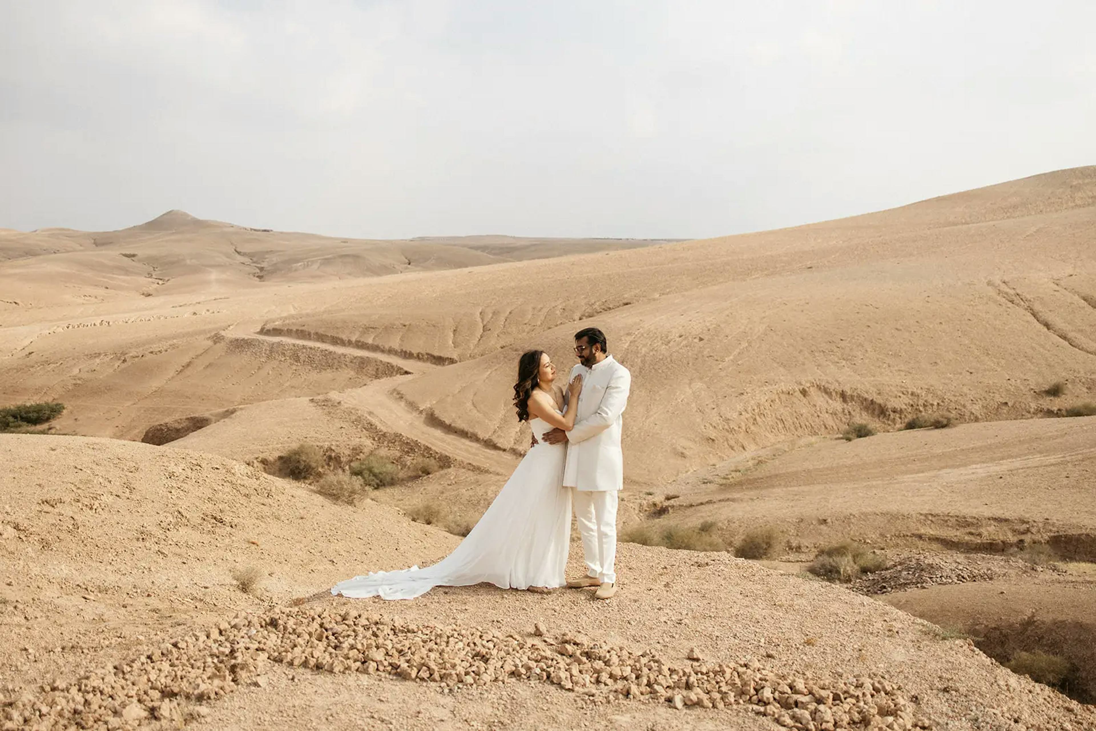 photo shoot of brides in the dessert of Agafay in Morocco