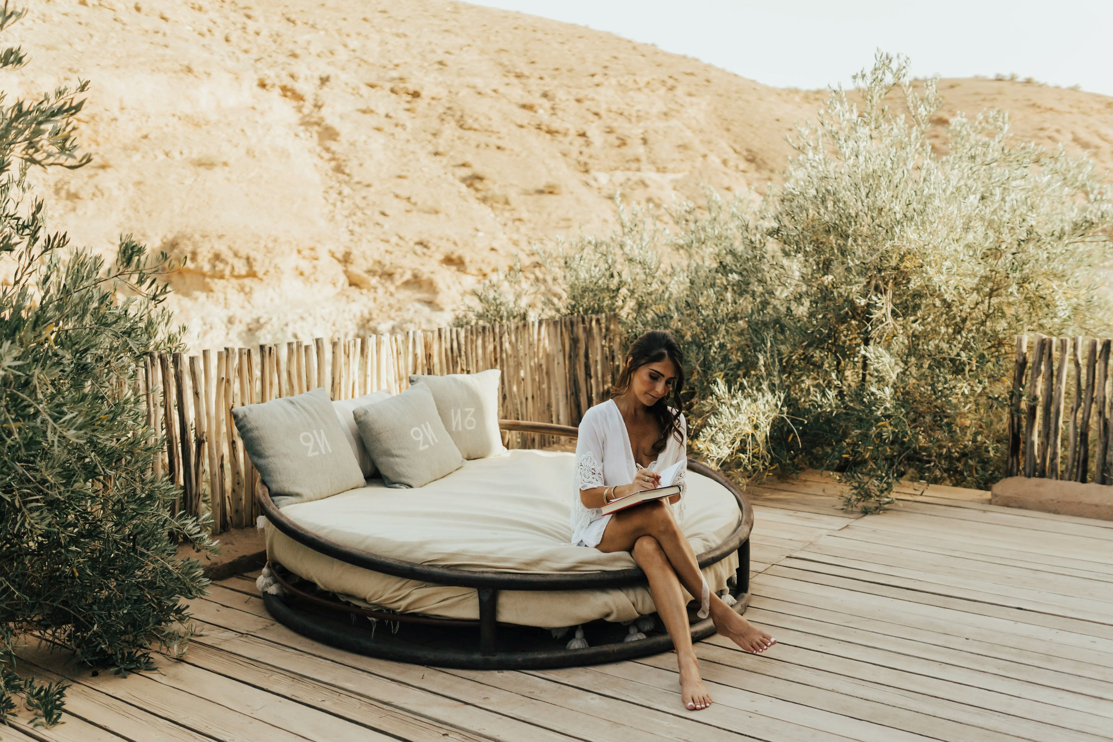 Bride writing vows in Marrakech desert