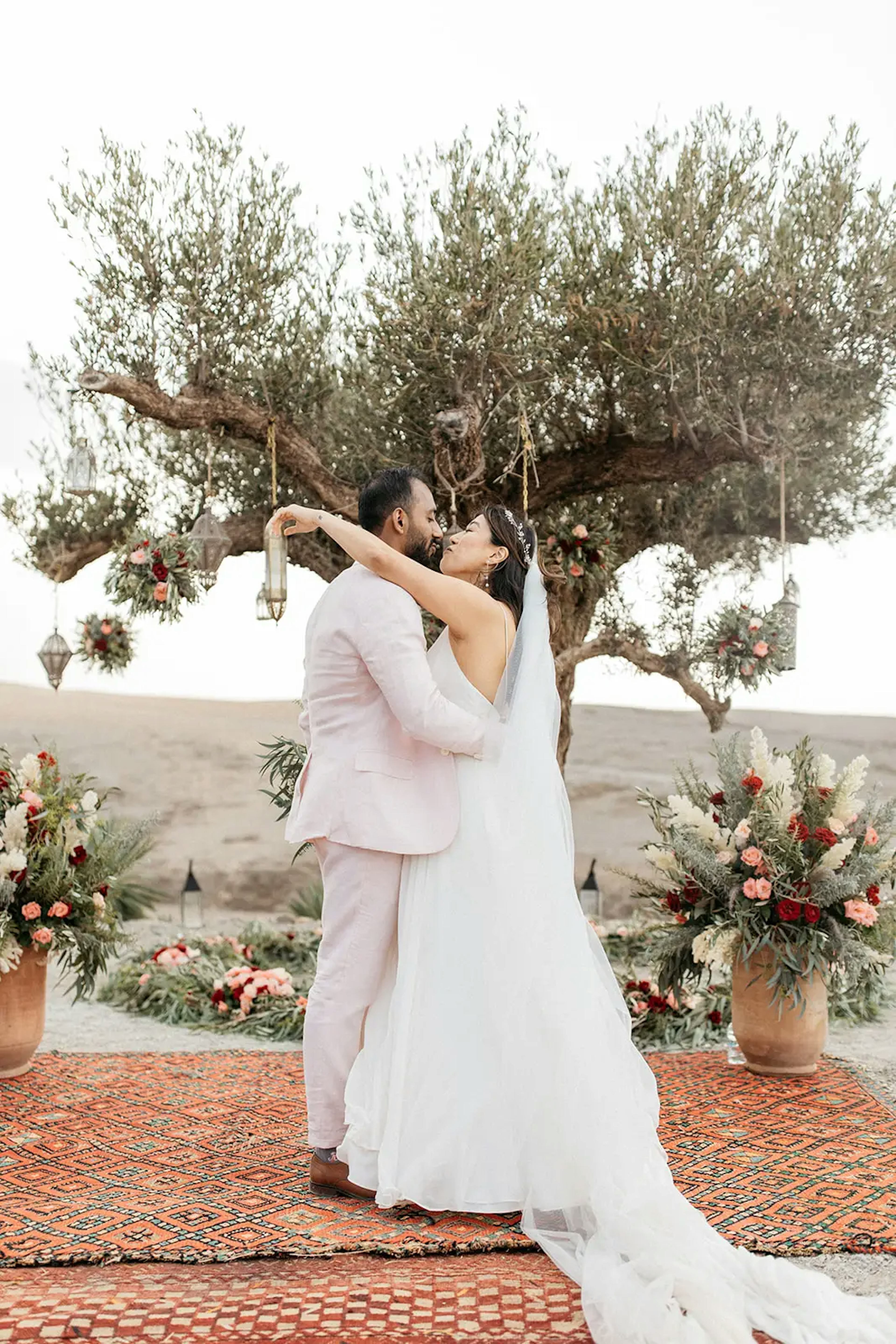 Couple's first kiss at desert wedding