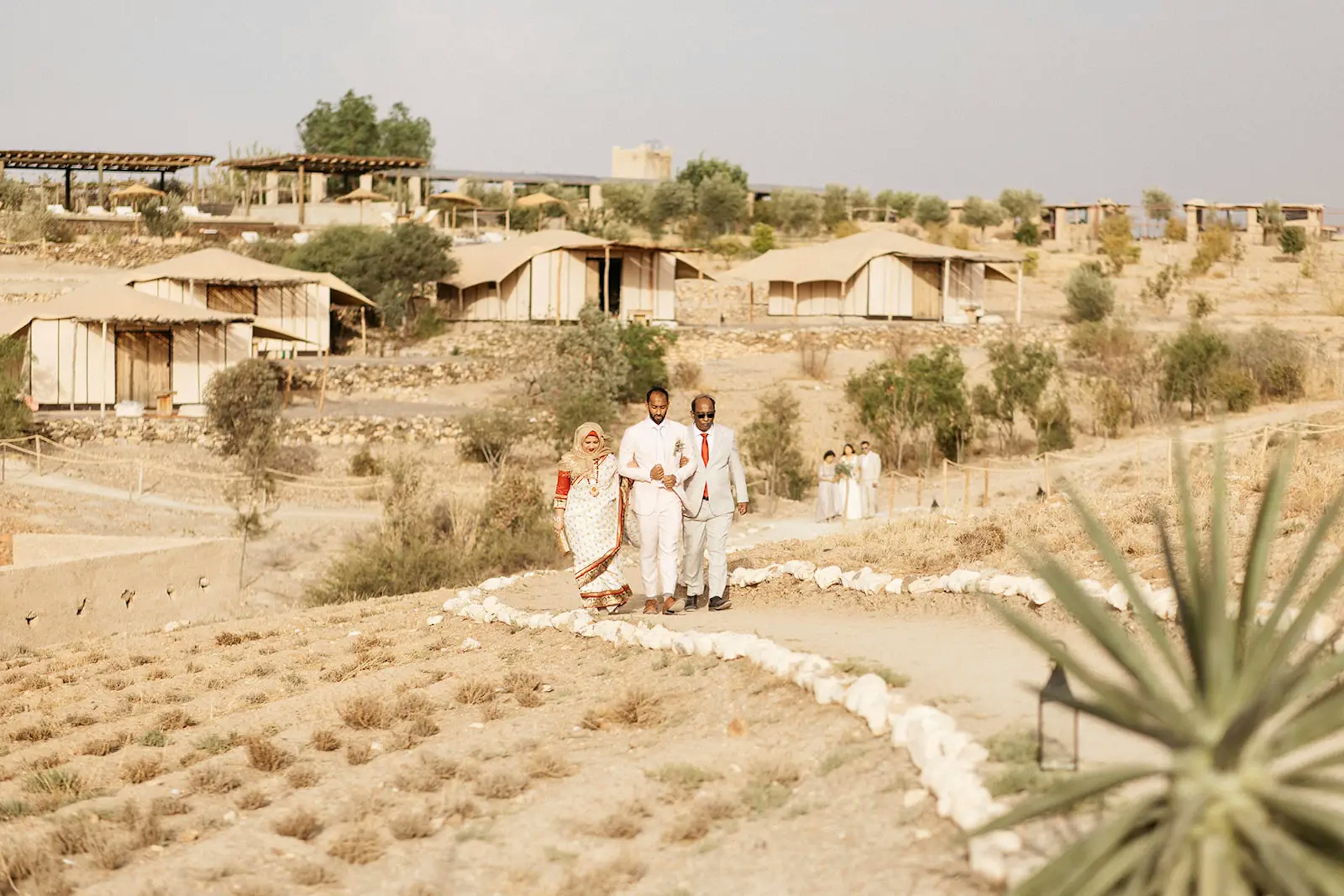 Walking to wedding ceremony in Agafay desert