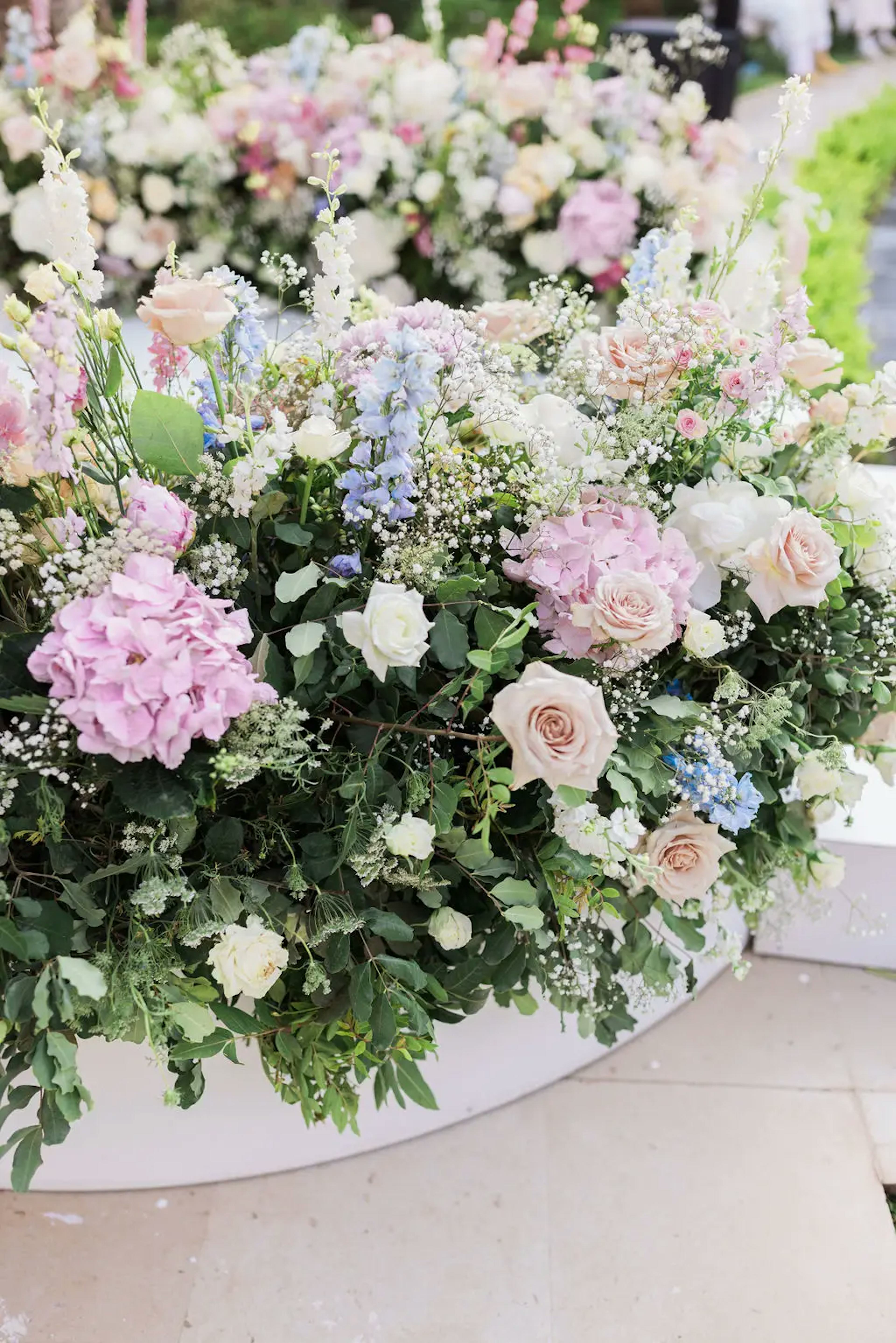 Pastel coloured flower arrangements