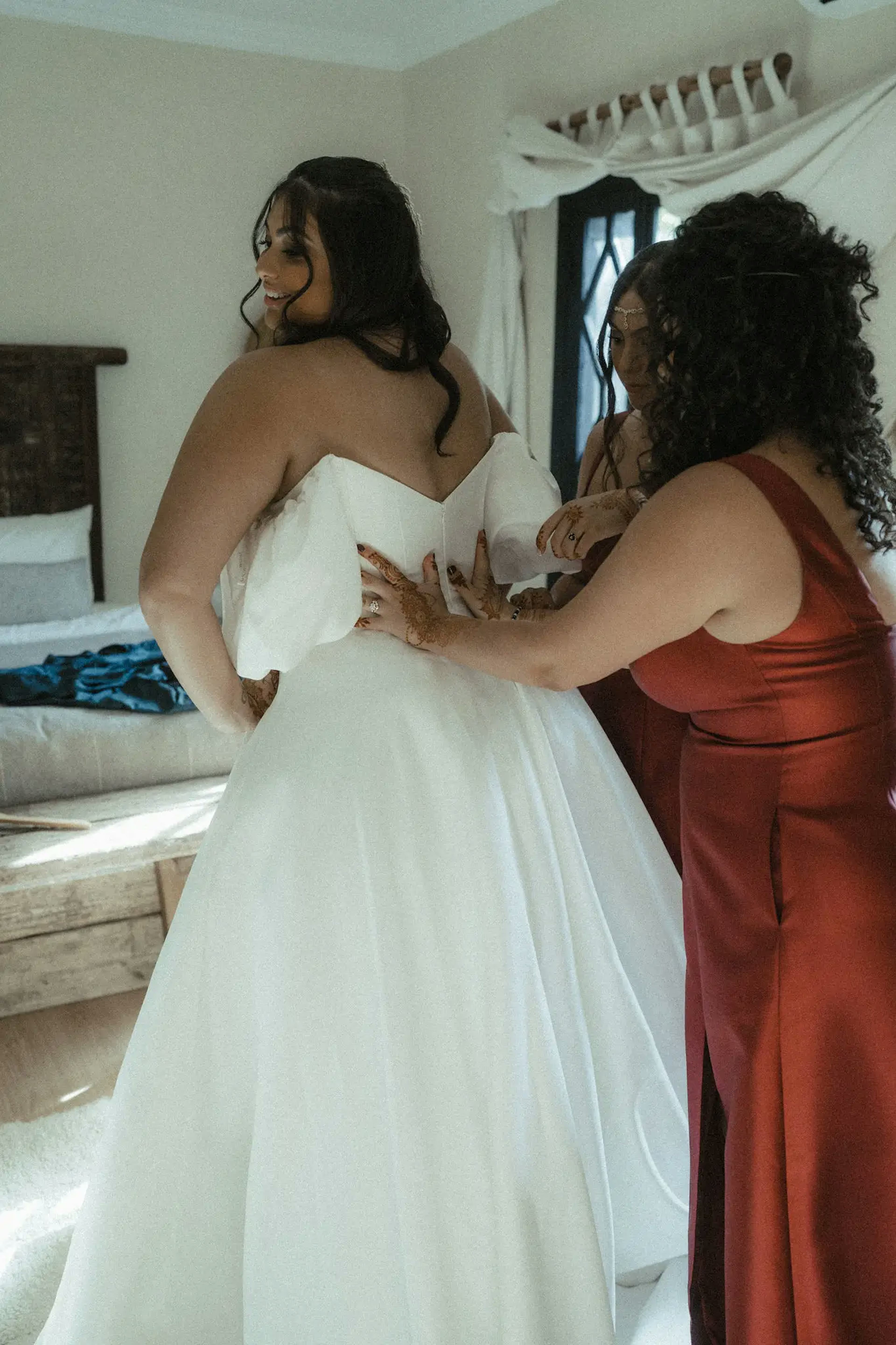 Putting on the wedding dress 