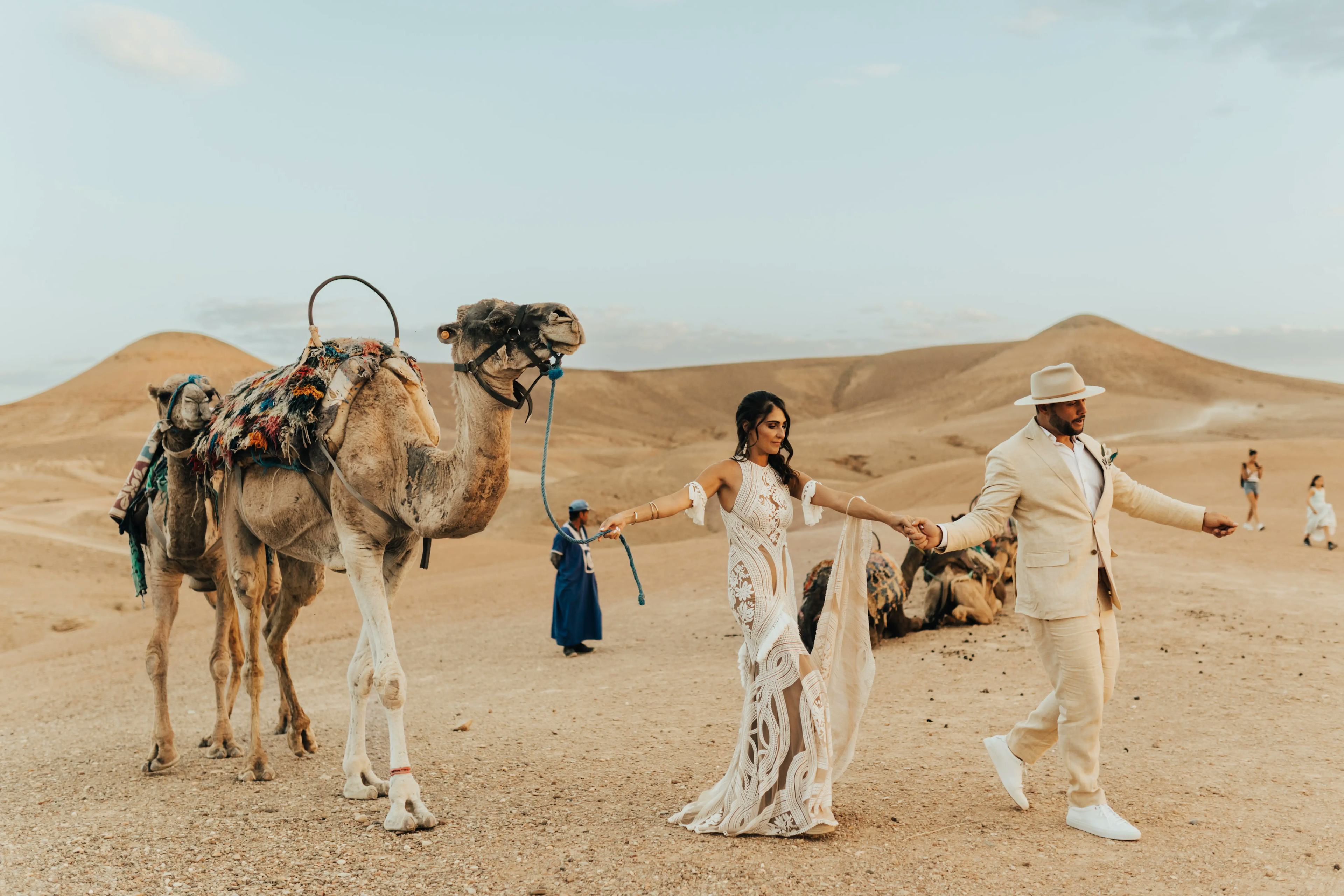 Wedding couple with Camel in Agafay Desert