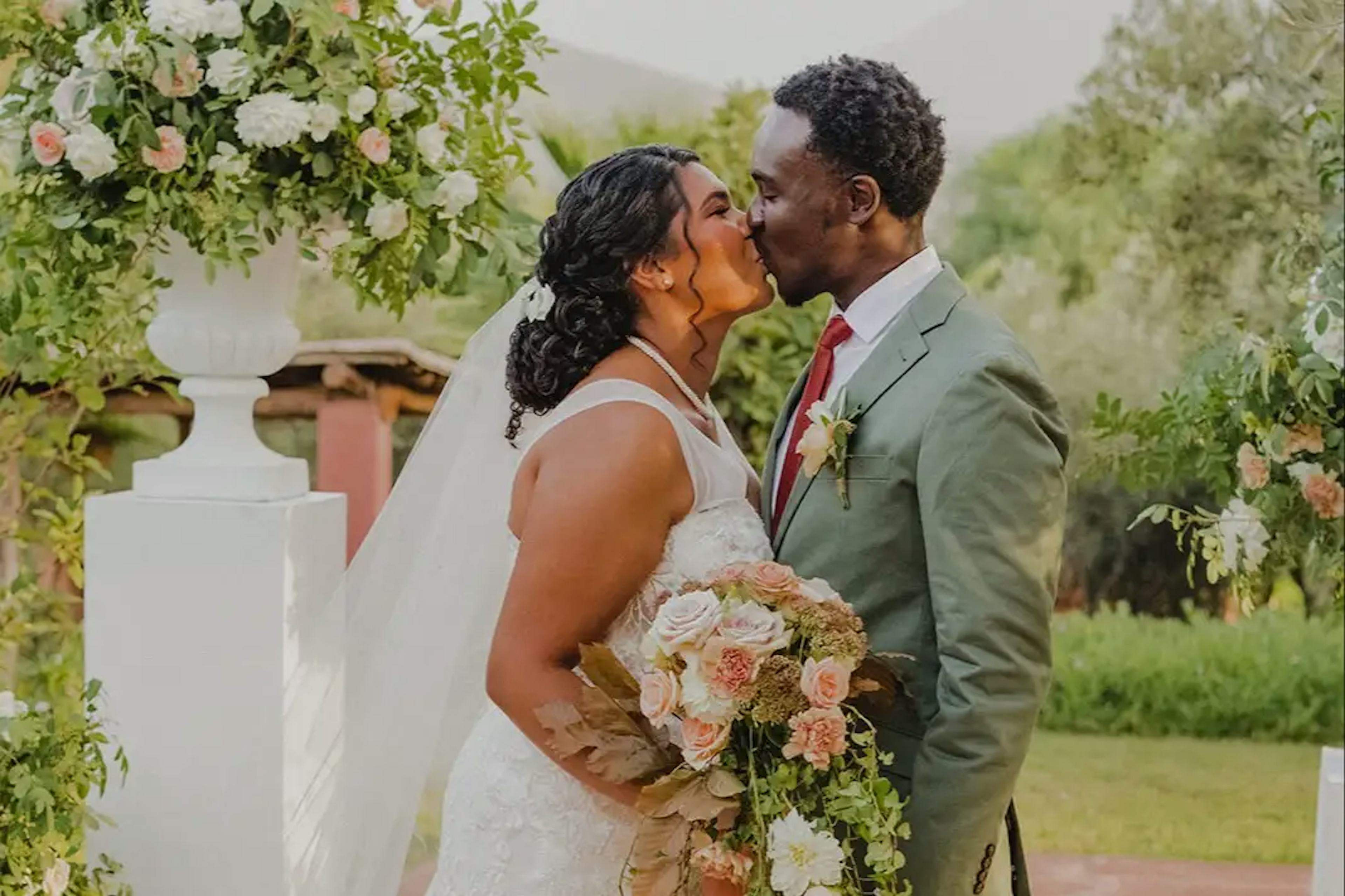 Couple kissing at wedding ceremony in Morocco