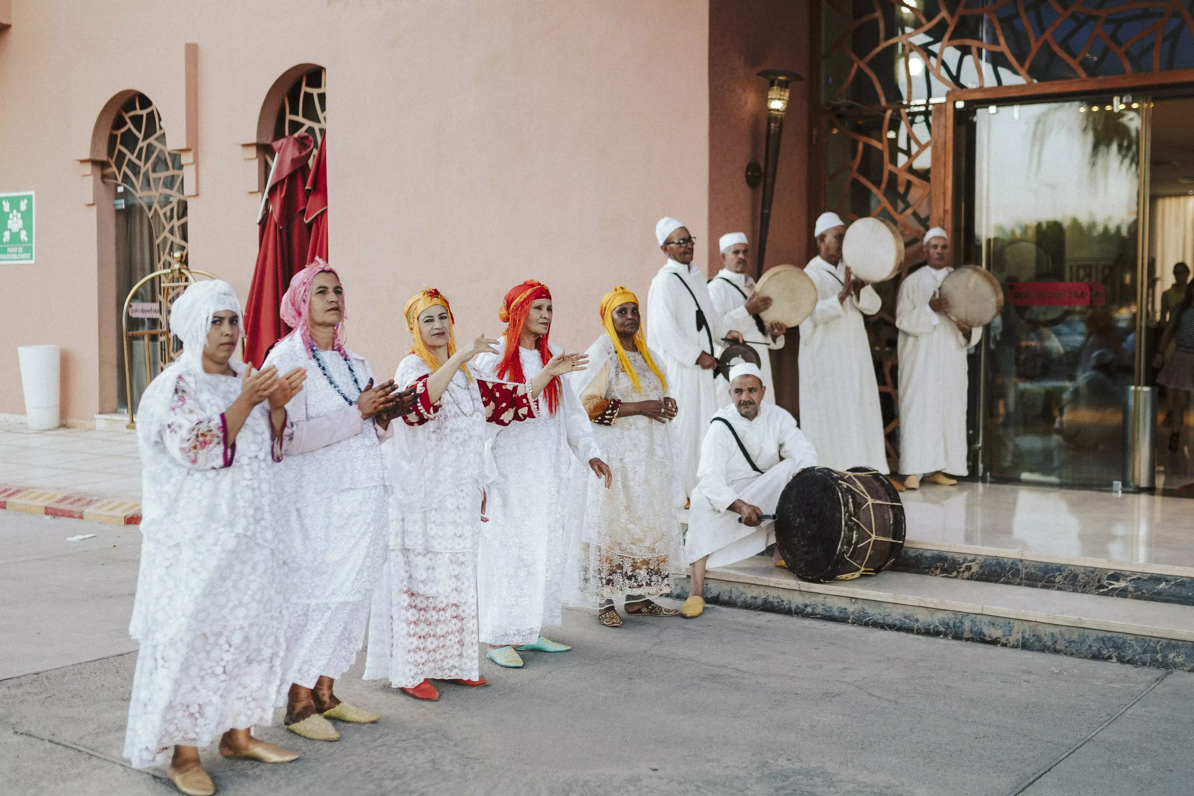 Group of traditional musicians who welcome guests