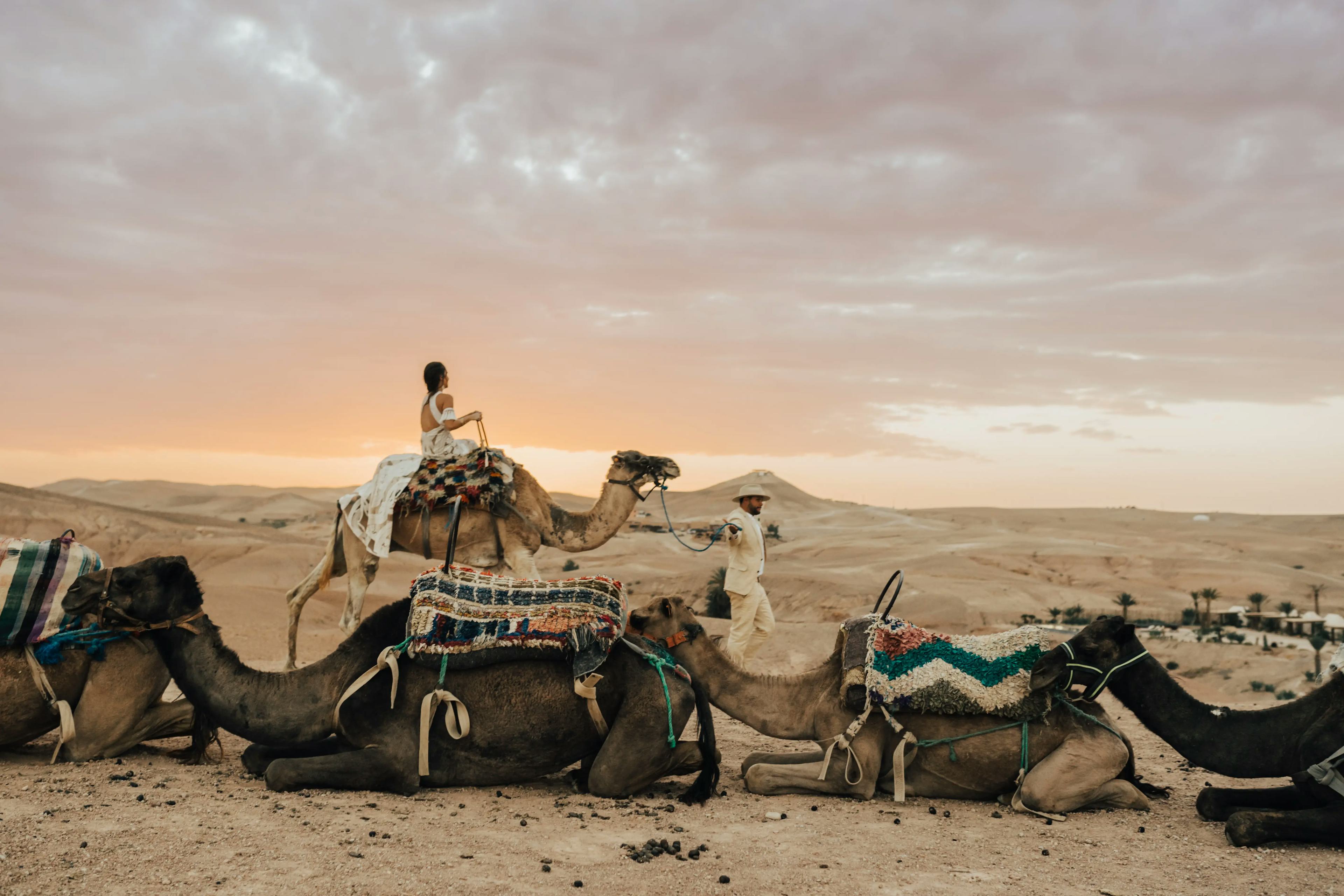 Couple on camels in Agafay desert