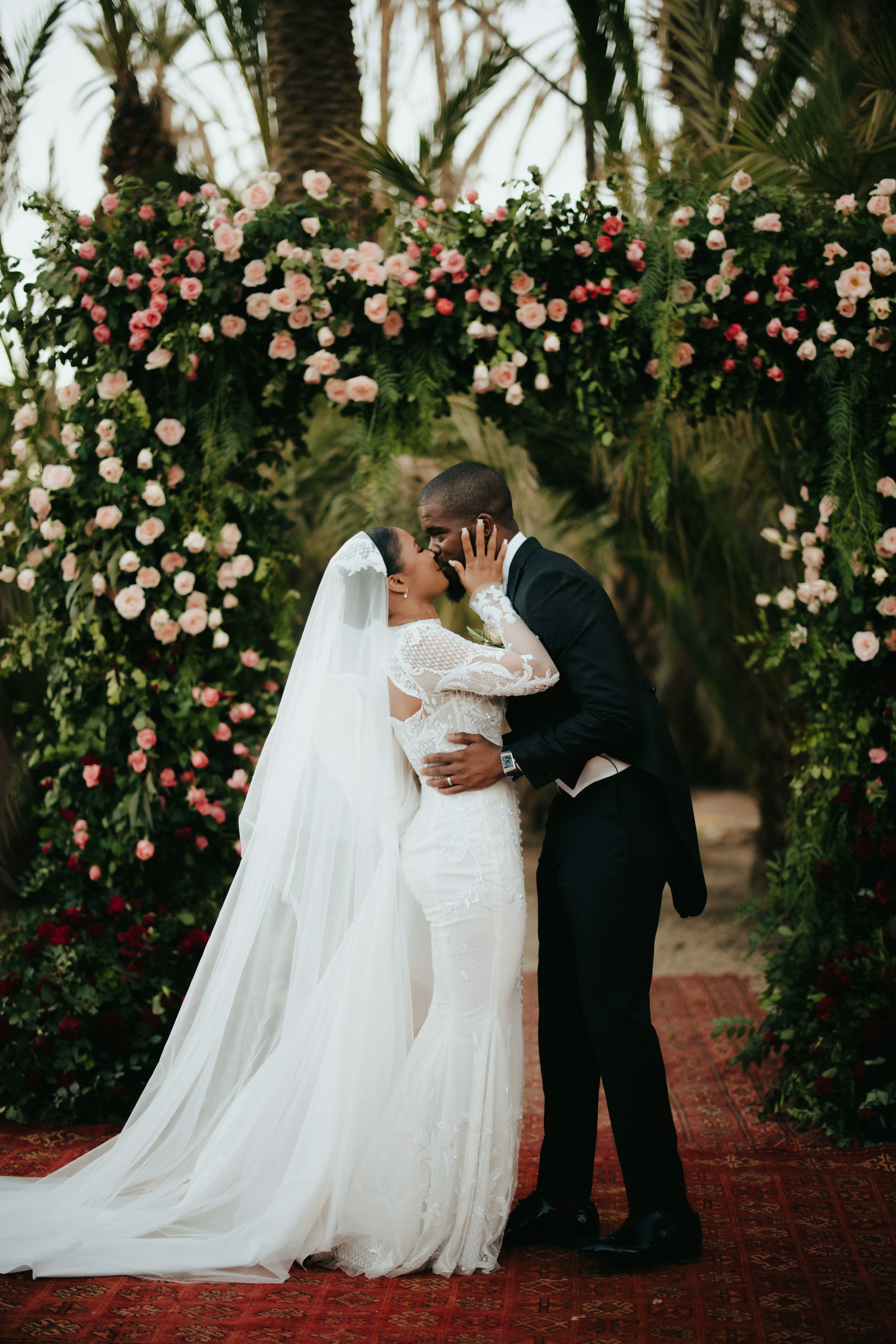 Pink wedding floral arch