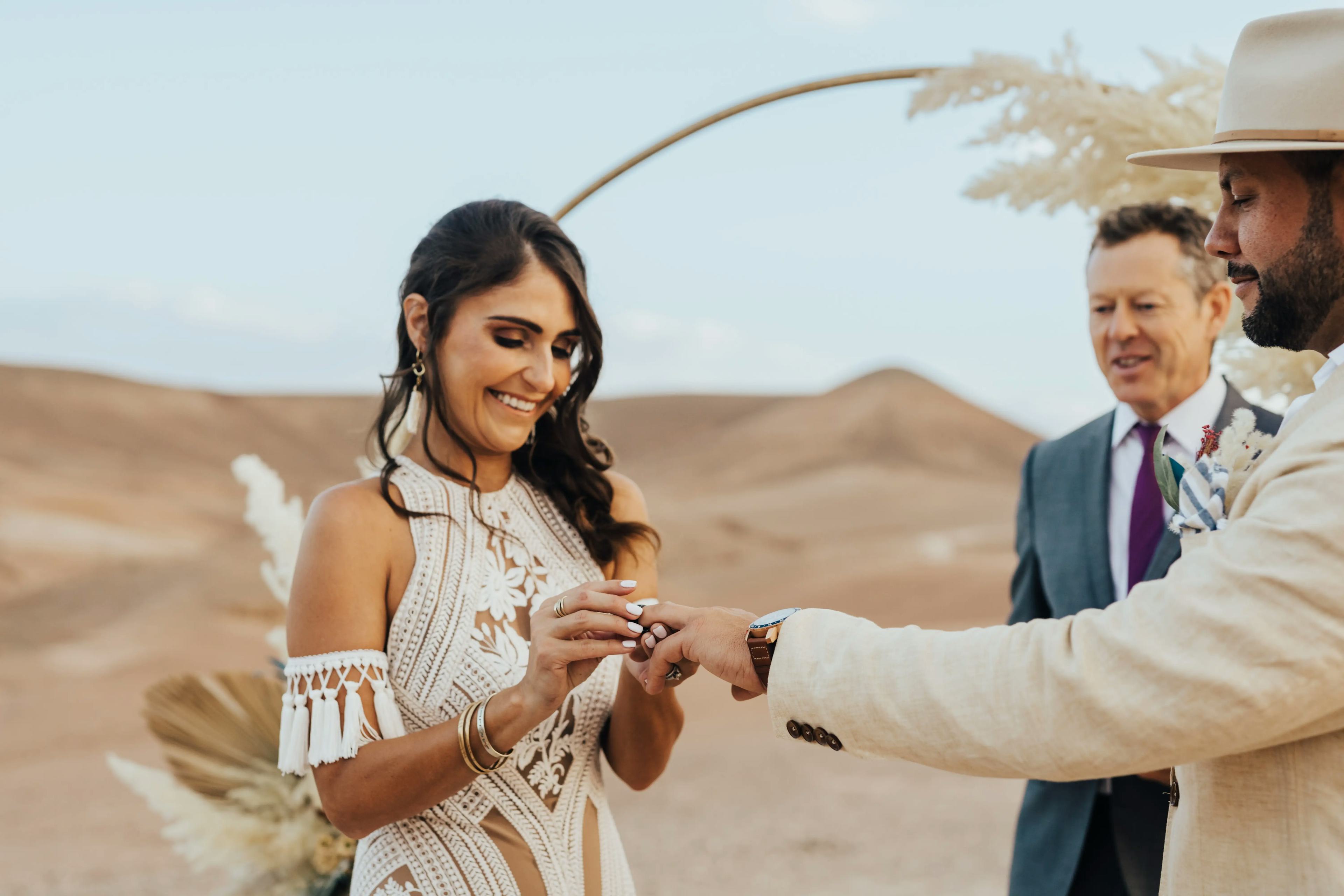 Exchanging rings in desert wedding Marrakech