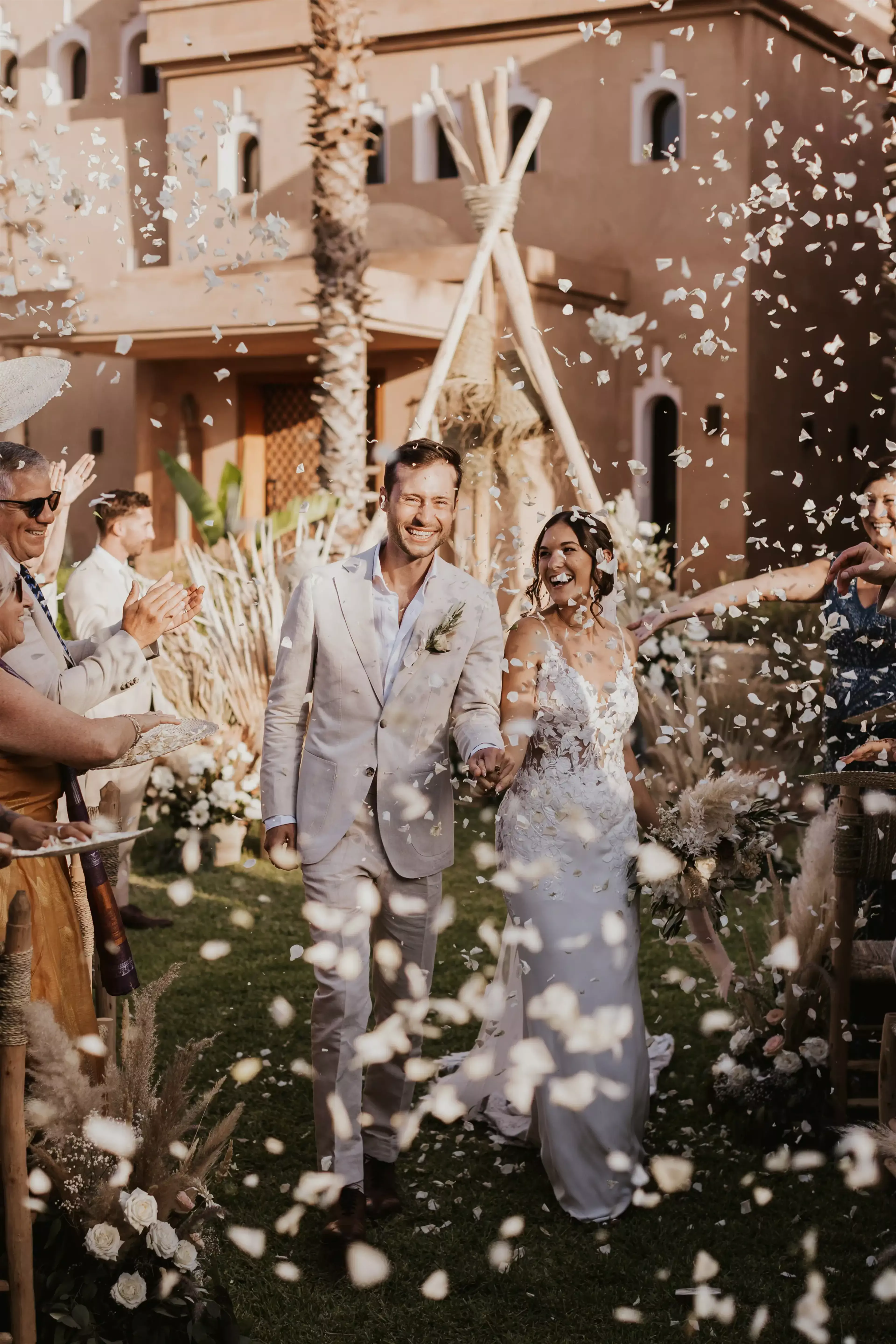 Confetti photo walking down the aisle 