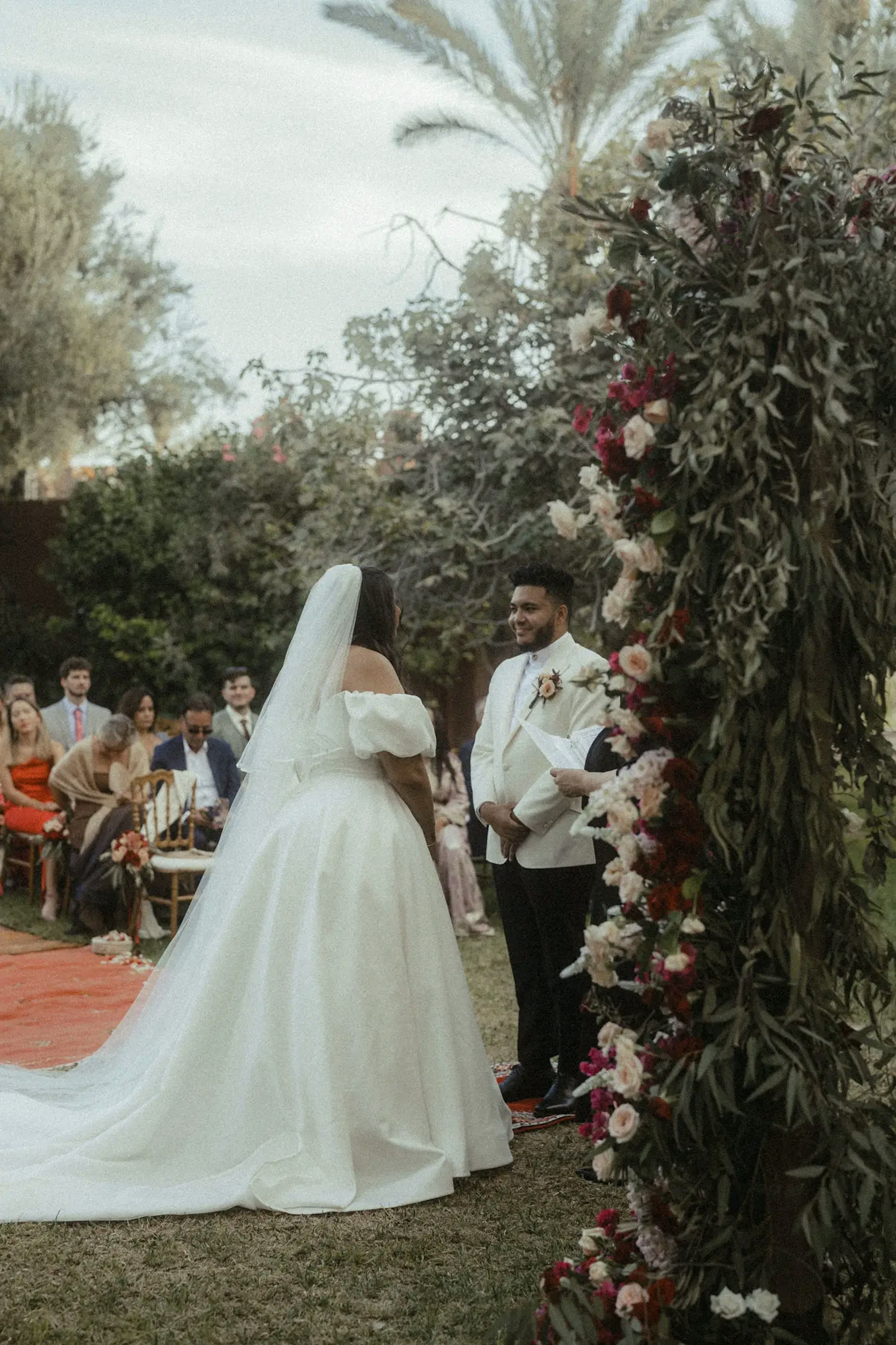 The spouses during the ceremony